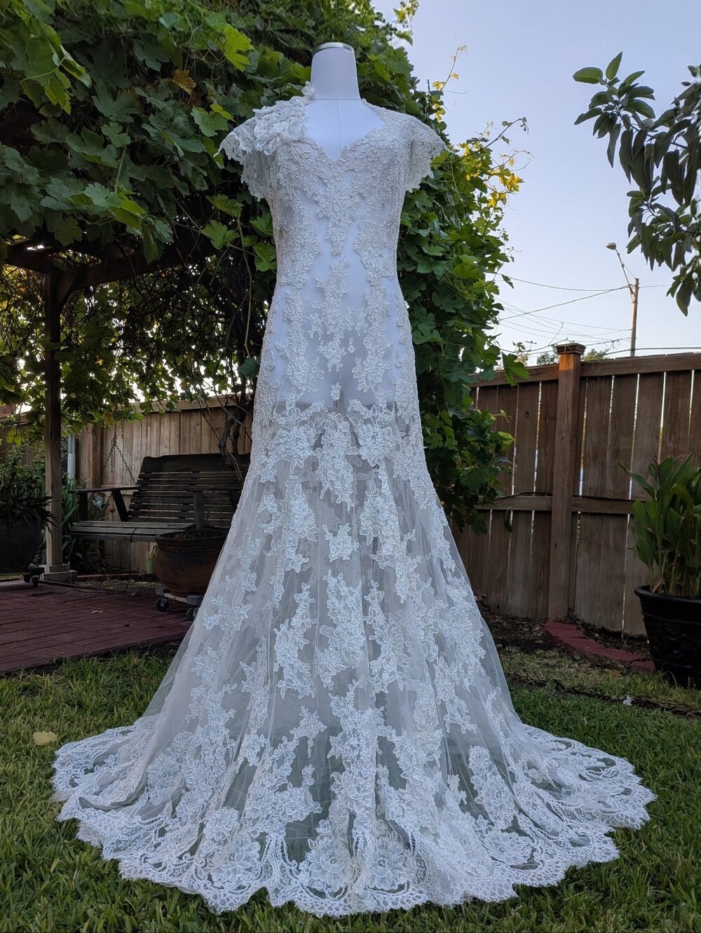 Elegant White Lace Bridal Gown with Scalloped Train